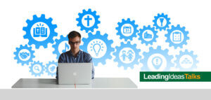Person sitting at computer with images of church icons in cogs surrounding
