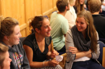 Welcoming Is the Top Factor in Church Choice Smiling groups of younger adults engaged in animated conversations