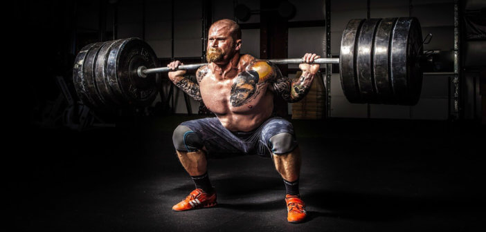 Weightlifter struggling to lift heavy weights