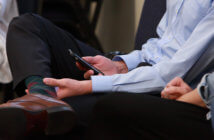 Stop Telling People to Turn Off Their Smartphones in Church Person sitting in a worship service using their smartphone
