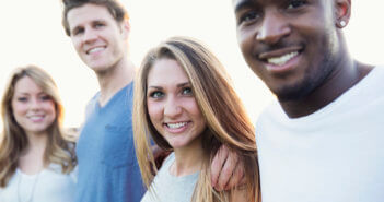 Group of smiling millennials