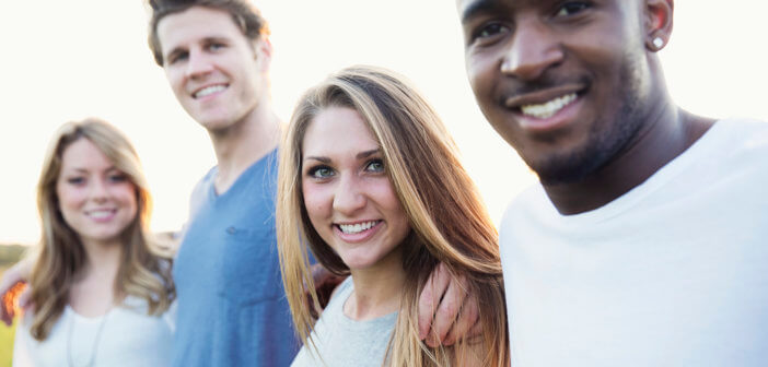 Group of smiling millennials