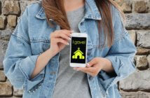 Asking Millennials to Give Young adult holding a cell phone that shows a donation to the church