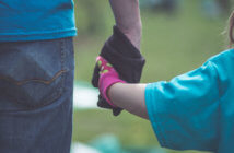 Are You Teaching People about Faith? Or How to Practice It? Adult holding a child's hand