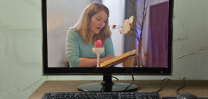 Desktop computer displaying online worship