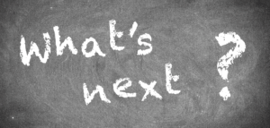 What's next? written in chalk on a blackboard