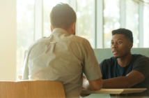 Two people in conversation