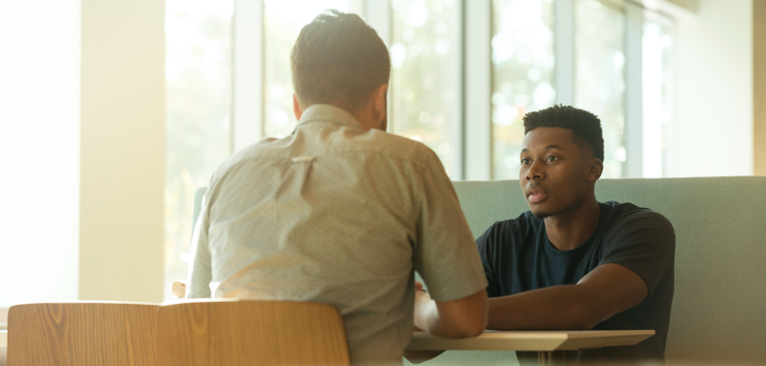 Two people in conversation