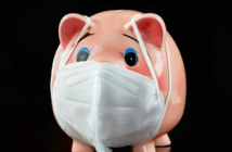 COVID-19 Reminds Us of Crucial Church Finance Safeguards Piggy bank wearing a surgical mask