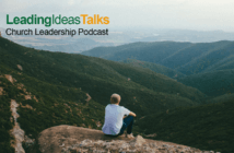 Episode 63: “What Promotes Clergy Wellbeing and Why it Matters” featuring Matt Bloom Person gazing at beautiful mountain views