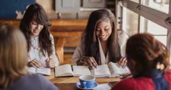 Young people in a Bible study in a coffee shop