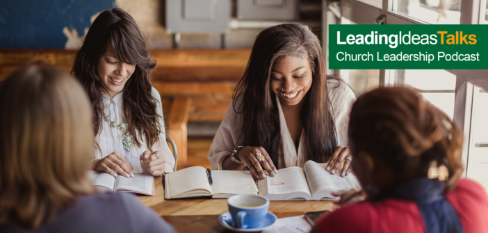 Young people having Bible study in a coffee shop