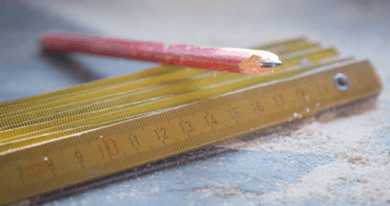 Wooden ruler, shop pencil, and sawdust