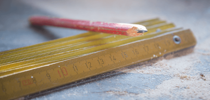 Wooden ruler, shop pencil, and sawdust