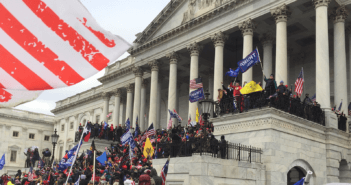 A crowd pressing up the steps towards the Senate Chamber of the Capitol