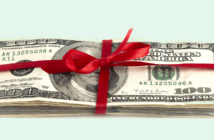 Is Your Church Ready to Receive a Large Gift? Stack of $100 bills tied up with a ribbon
