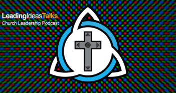 Logo with Christian cross rendered as a video game touch pad