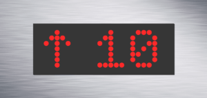 Elevator display showing up arrow and number 10