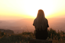 Helping People Connect with God through Nature Person taking in a beautiful sunrise