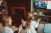 From Online Worship to Online Ministry Family clapping and interacting with online worship from their living room