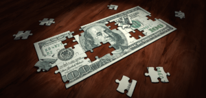 Puzzle of a hundred dollar bill
