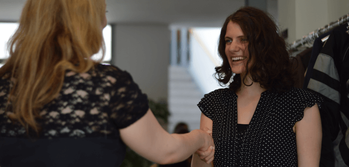 Person receiving a warm greeting at church