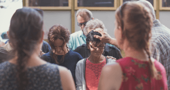 People being commissioned at church