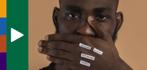 Black person with their hand over their mouth