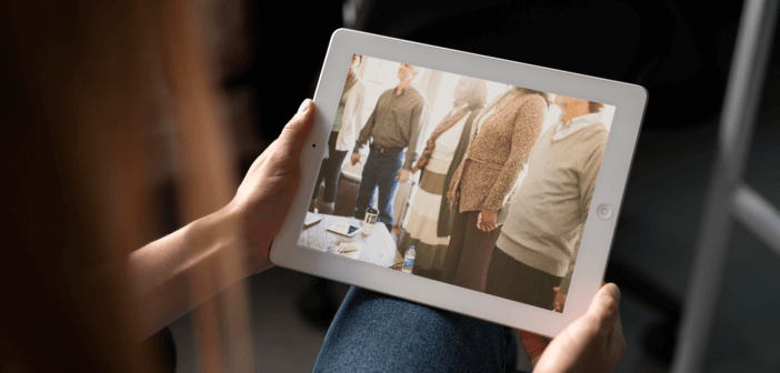 Person taking part in a Bible study through their tablet