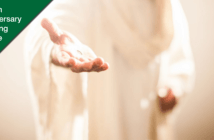Soft-focused image of Jesus extending his hand to you