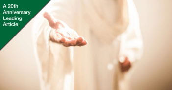 Soft-focused image of Jesus extending his hand to you