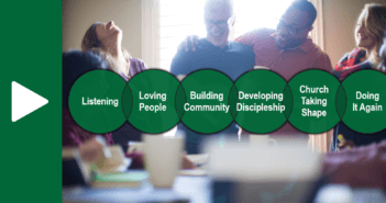 Mixed-age group worshiping and fellowshipping around a dining table