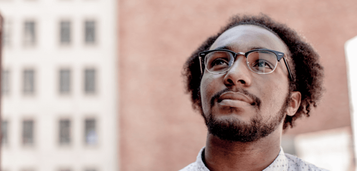 Person looking forward and up in contemplative thought