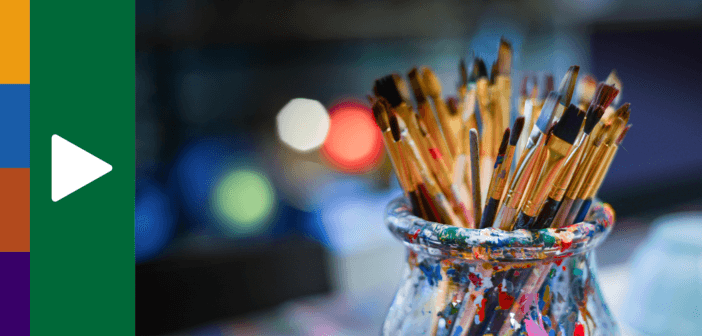 Artists paint brushes and paint splotches