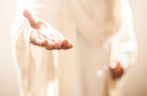 Image of Jesus holding out a welcoming hand