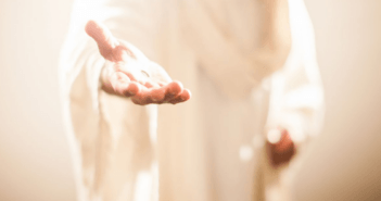 Image of Jesus holding out a welcoming hand