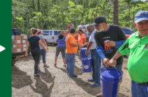 Volunteers for a line to pass supplies