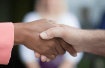 Handshake between two people of different races