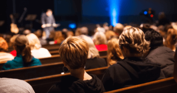 Church pews filled with congregants