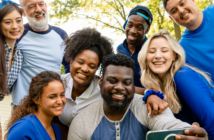 Diverse group smiling for a selfie