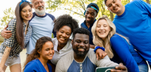 Diverse group smiling for a selfie