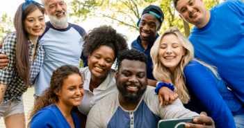 Diverse group smiling for a selfie