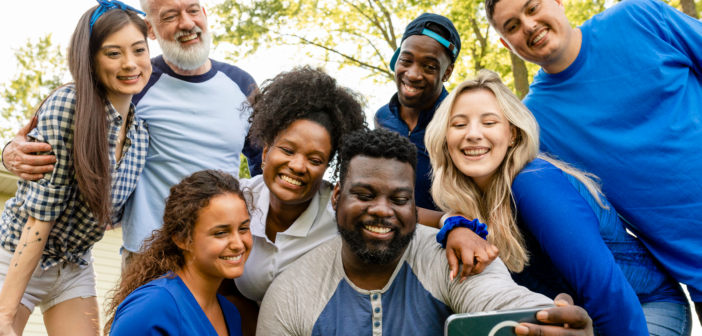 Diverse group smiling for a selfie