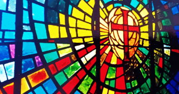 Stained glass window of a cross