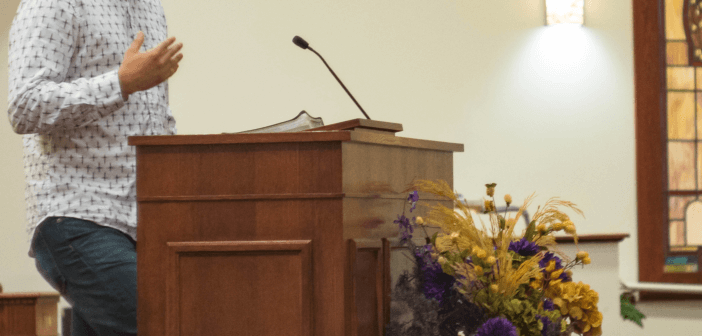 Layperson speaking from the chancel