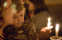 Family at candlelight service