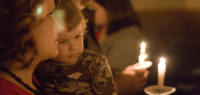 Family at candlelight service