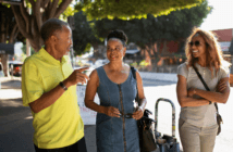 Small group of church folks walking through town