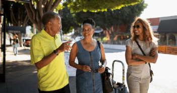 Small group of church folks walking through town