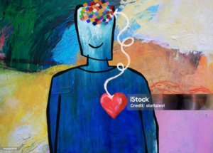 Mind and heart connection. man with brain and heart connected.